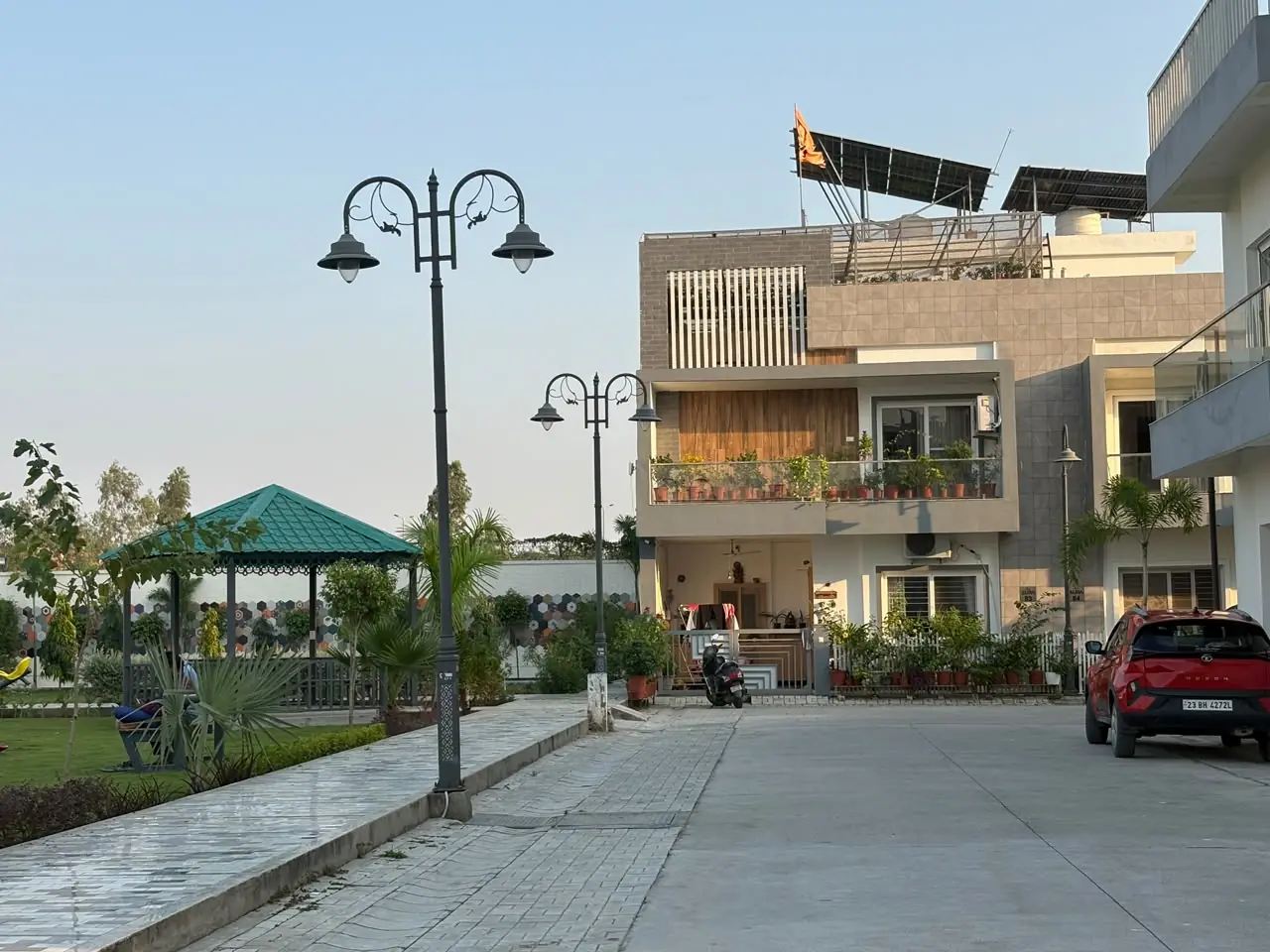 Homes facing the park, rooftop solar above — JHM Aura