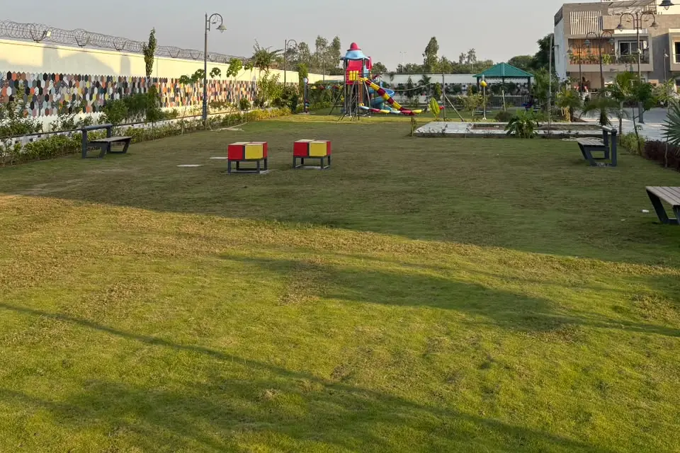 Landscaped lawn at JHM Aura